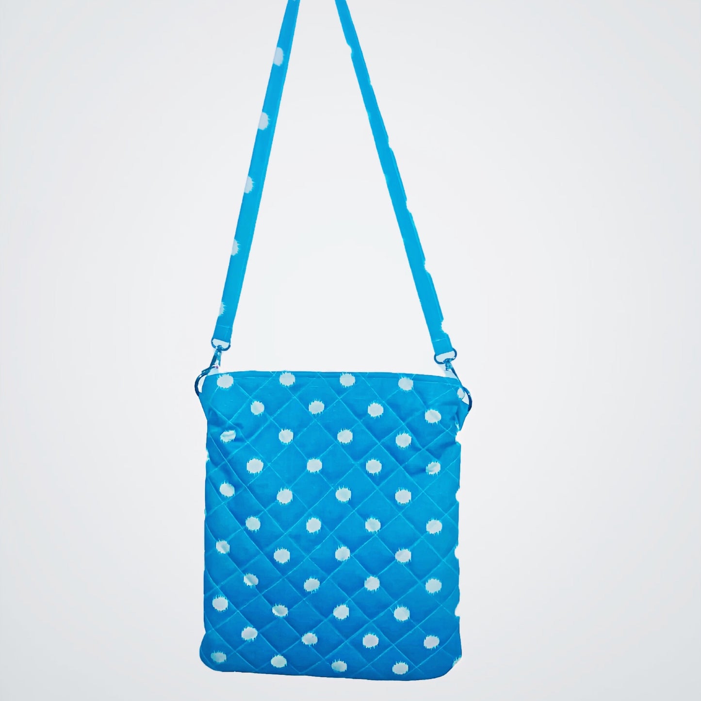 MEDOW - The blue/turquoise polka dot messenger bag